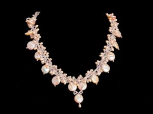 golden colored pearl necklace 1