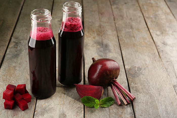 Glass bottles of beet juice 1