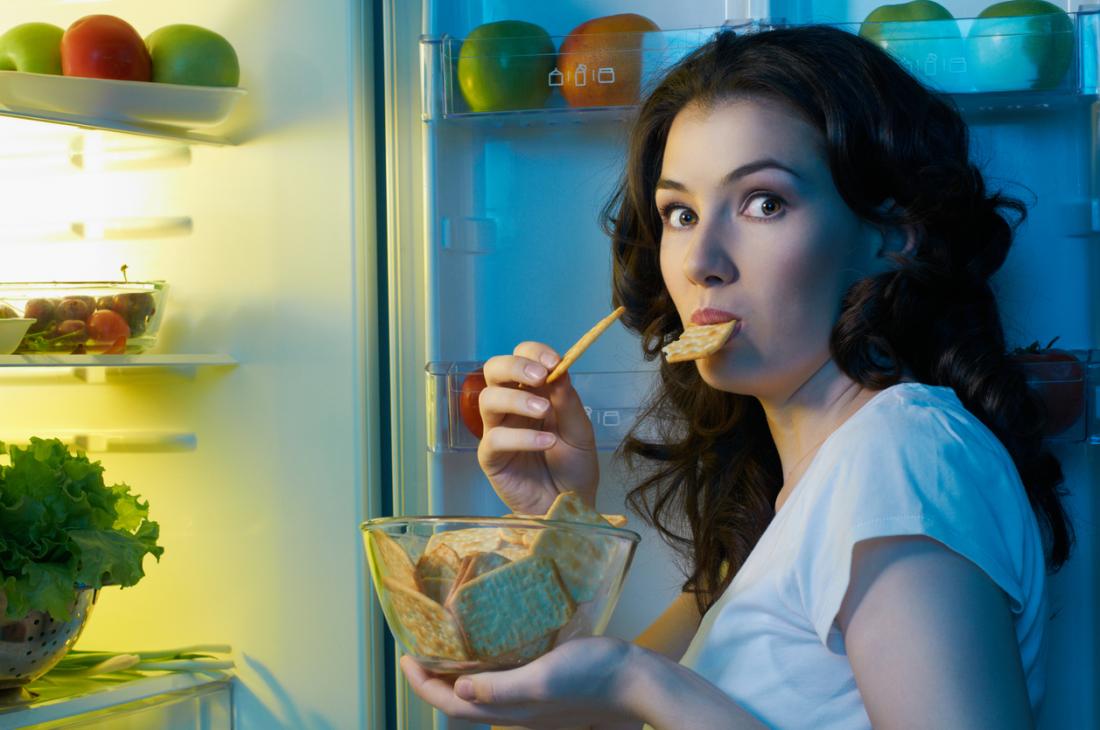 a woman having a late night snack