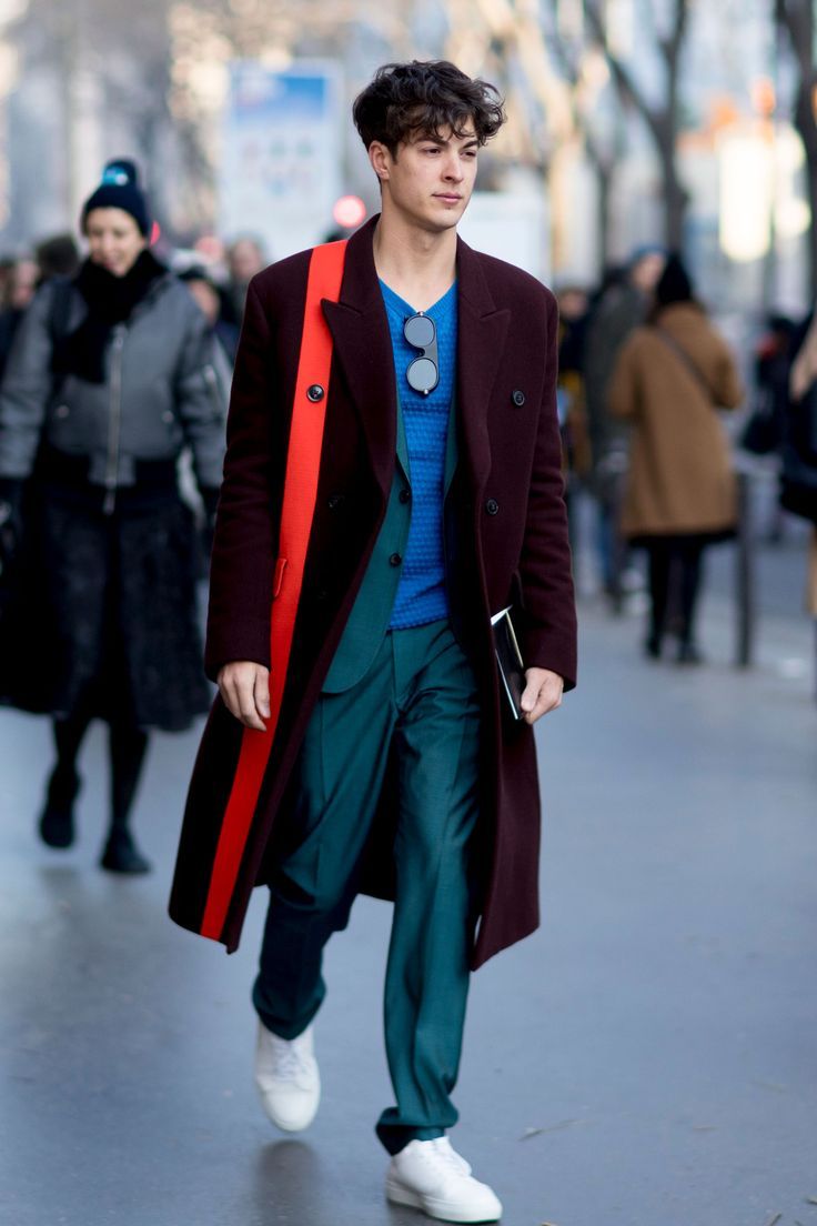 Layer a jacket beneath a single striped coat